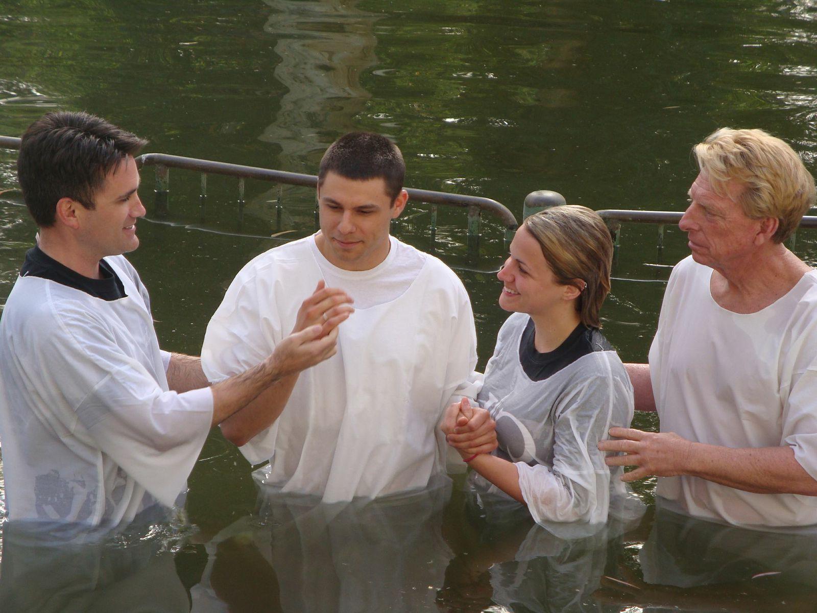 During the trip, many were baptized in the  River Jordan by Campbellsville University  faculty and staff members, Dr. Ted Taylor,  Dr. Shane Garrison, Dr. Scott Wigginton  and David Wray. From left: Taylor, Shelby  Hicks, Dalton Hicks and Garrison.